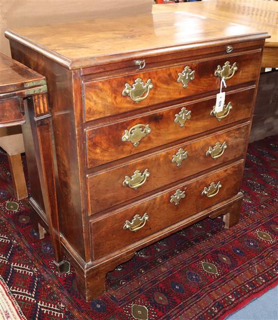 A George III mahogany chest with brushing slide W.74cm
